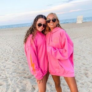 hot pink sweatshirt